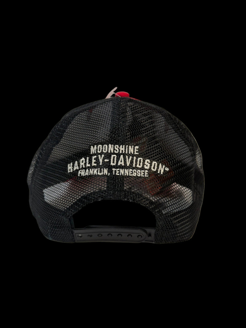 A black mesh-back trucker cap shown from the back, featuring white embroidered text that reads 'MOONSHINE HARLEY-DAVIDSON FRANKLIN, TENNESSEE' and a small red button on top.