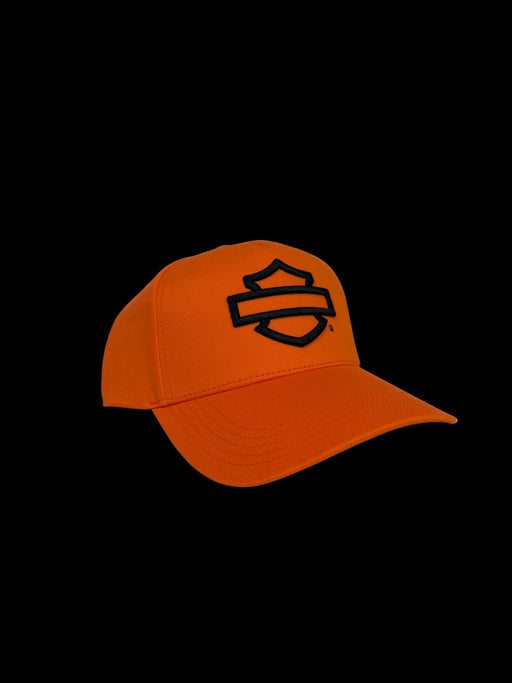 An orange baseball cap with a black embroidered Harley-Davidson logo on the front, displayed on a light gray background.